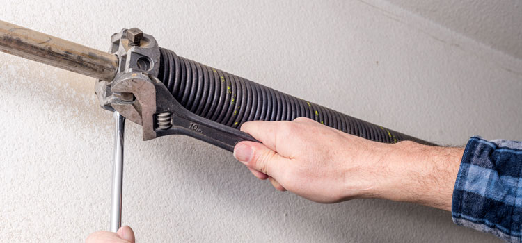 Garage Door Torsion Spring Replacement in Pearson Airpot, ON